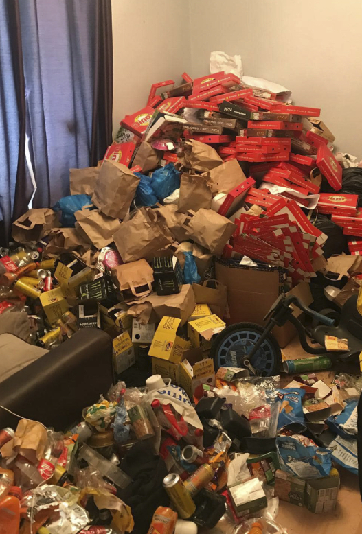 Room stacked with boxes before hoarding clearance